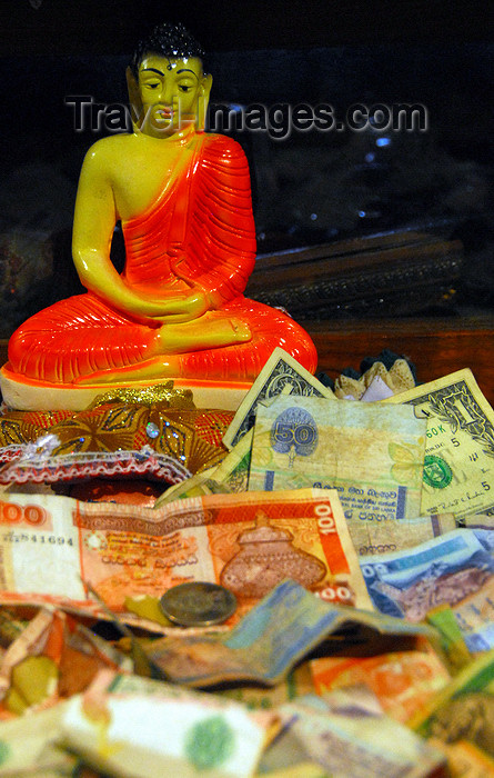 sri-lanka278: Kandy, Central province, Sri Lanka: Buddha, rupees and dollars - Sri Dalada Maligawa - Temple of the Sacred Tooth Relic - photo by M.Torres - (c) Travel-Images.com - Stock Photography agency - Image Bank