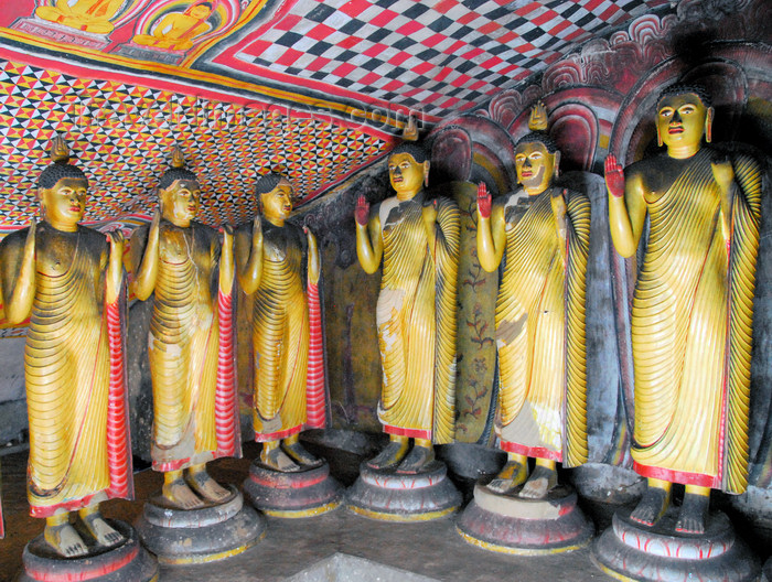 sri-lanka295: Dambulla, Central Province, Sri Lanka: six Buddhas stand in a corner - Maha Alut Vihara cave - Dambulla cave temple - UNESCO World Heritage Site - photo by M.Torres - (c) Travel-Images.com - Stock Photography agency - Image Bank