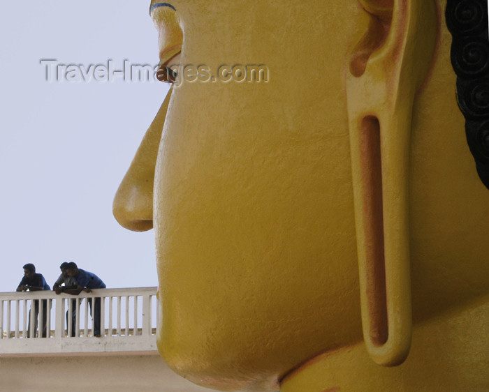 sri-lanka55: Matara, Southern province, Sri Lanka: Buddha's face and tourists - ear detail - photo by B.Cain - (c) Travel-Images.com - Stock Photography agency - Image Bank