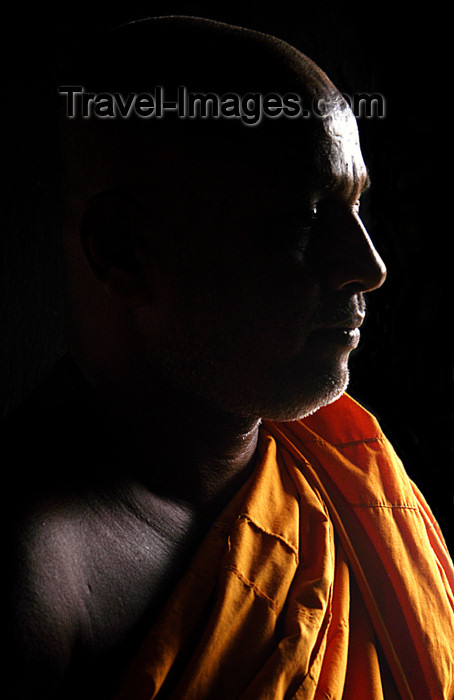 sri-lanka86: Sri Lanka - Colombo: Sri-Lankan Buddhist Monk in shadow - saffron robe - photo by B.Cain - (c) Travel-Images.com - Stock Photography agency - Image Bank