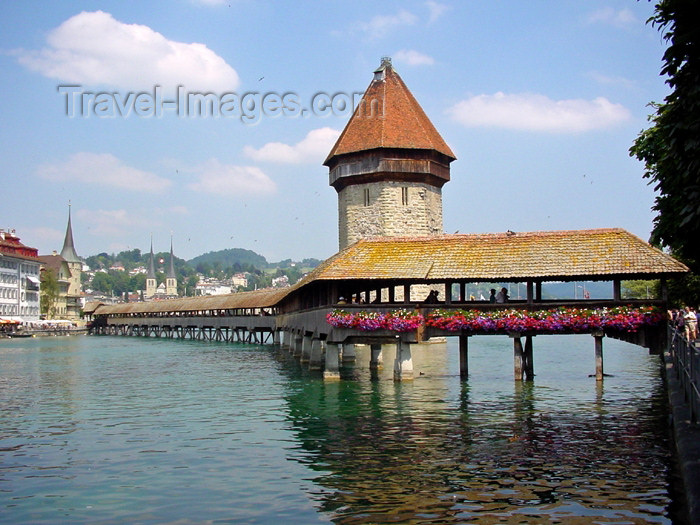 switz166: Switzerland / Suisse / Schweiz / Svizzera - Luzern / Lucerne / Lucerna: roofed wooden bridge - Kappelbrucke - Lake of the four Forest Cantons (photo by Christian Roux) - (c) Travel-Images.com - Stock Photography agency - Image Bank