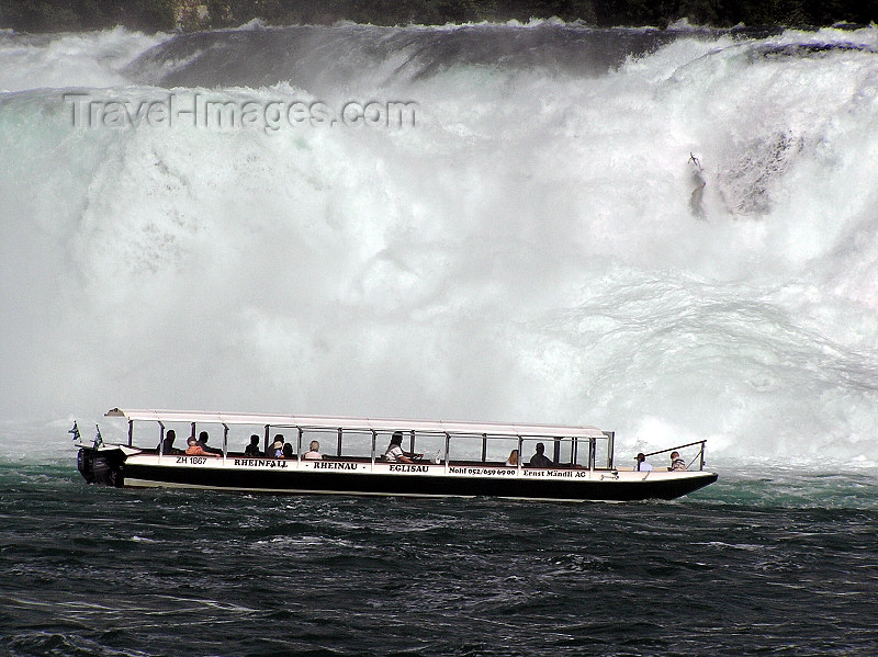 switz336: Switzerland - Neuhausen am Rheinfall - Schaffhausen canton - boat at the waterfalls - Rheinfall - photo by J.Kaman - (c) Travel-Images.com - Stock Photography agency - Image Bank