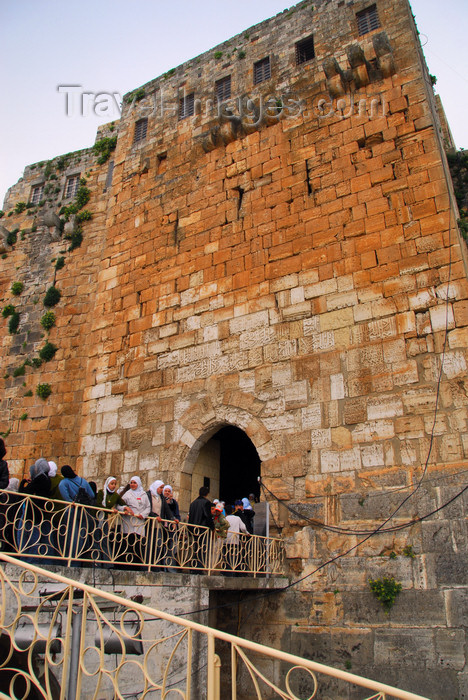 syria198: Crac des Chevaliers / Hisn al-Akrad, Al Hosn, Homs Governorate, Syria: students wait to enter the castle - UNESCO World Heritage Site - photo by M.Torres /Travel-Images.com - (c) Travel-Images.com - Stock Photography agency - Image Bank