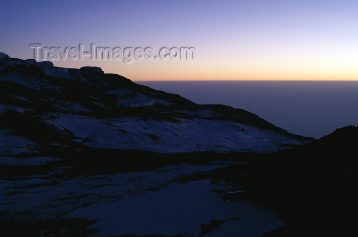 tanzania70: Tanzania - Kilimanjaro NP: Marangu Route - day 5 - Mount Kilimanjaro, the Kibo snow and clouds in the early morning light - photo by A.Ferrari - (c) Travel-Images.com - Stock Photography agency - Image Bank