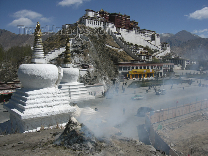 tibet58: Tibet - Lhasa: Potala palace, stupas and ritual fire - photo by M.Samper - (c) Travel-Images.com - Stock Photography agency - Image Bank