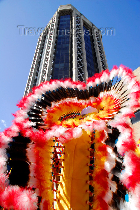 trinidad-tobago102: Port of Spain, Trinidad and Tobago: Central Bank Tower - Eric Williams Plaza - architect Anthony C. Lewis - office building behind indian costume - carnival - photo by E.Petitalot - (c) Travel-Images.com - Stock Photography agency - Image Bank