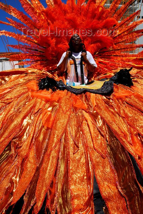 trinidad-tobago111: Port of Spain, Trinidad and Tobago: man with red costume during the carnival parade - photo by E.Petitalot - (c) Travel-Images.com - Stock Photography agency - Image Bank