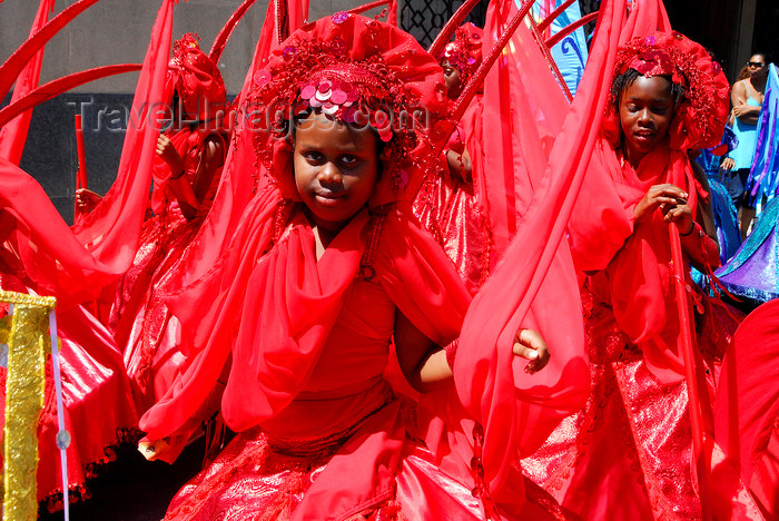 trinidad-tobago113: Port of Spain, Trinidad and Tobago: young girls dancing in red costume - carnival - photo by E.Petitalot - (c) Travel-Images.com - Stock Photography agency - Image Bank