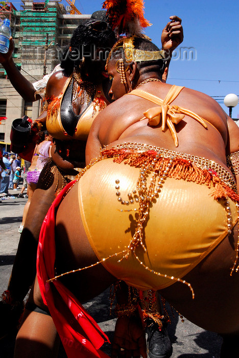 trinidad-tobago115: Port of Spain, Trinidad and Tobago: big women dancing at the carnival parade - the form of dancing is locally called 'Wining' - photo by E.Petitalot - (c) Travel-Images.com - Stock Photography agency - Image Bank