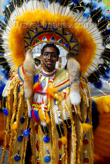 trinidad-tobago118: Port of Spain, Trinidad and Tobago: man with indian costume and fox tails during the carnival celebrations - photo by E.Petitalot - (c) Travel-Images.com - Stock Photography agency - Image Bank