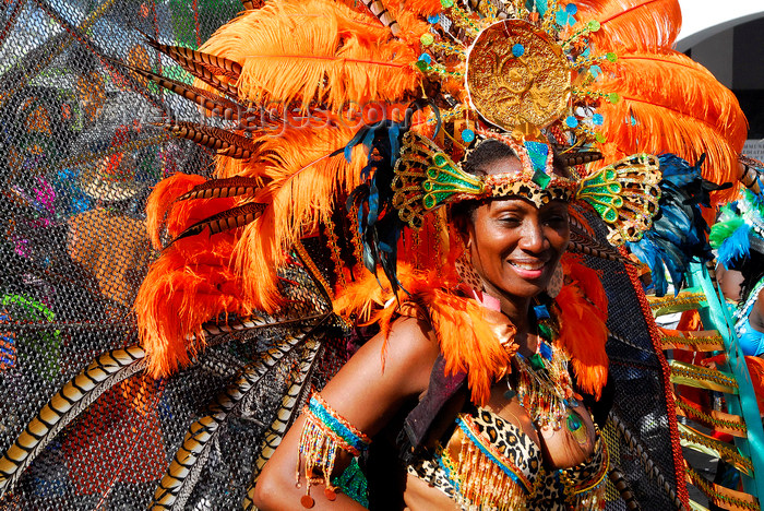 trinidad-tobago123: Port of Spain, Trinidad and Tobago: smiling woman in a very colorful costume at the carnaval parade - photo by E.Petitalot - (c) Travel-Images.com - Stock Photography agency - Image Bank