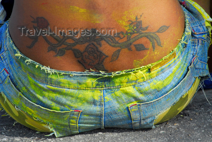 trinidad-tobago136: Port of Spain, Trinidad and Tobago: tattoo on the back of a woman - photo by E.Petitalot - (c) Travel-Images.com - Stock Photography agency - Image Bank