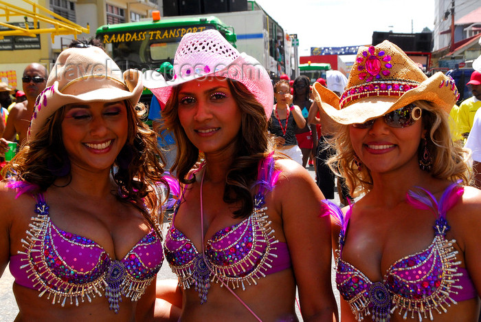 trinidad-tobago140: Port of Spain, Trinidad and Tobago: trio of Trinidad girls wearing colourful hats during carnival - photo by E.Petitalot - (c) Travel-Images.com - Stock Photography agency - Image Bank