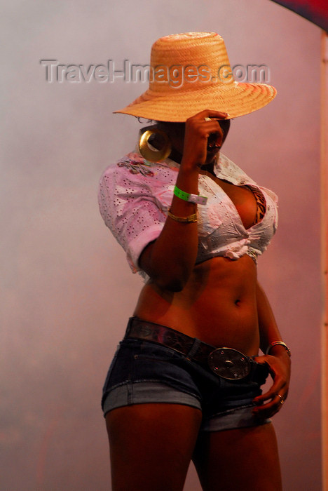 trinidad-tobago168: Port of Spain, Trinidad and Tobago: shorts and hat in fashion for a Trinidad girl - photo by E.Petitalot - (c) Travel-Images.com - Stock Photography agency - Image Bank