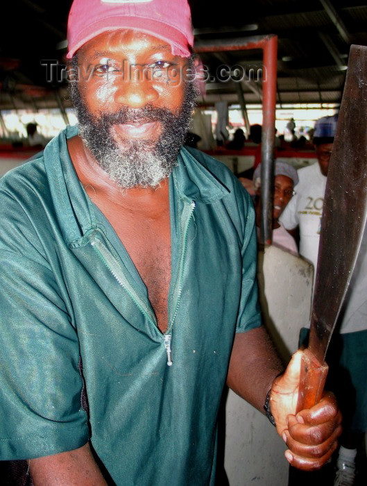 trinidad-tobago6: Trinidad - Port of Spain: a butcher and his machete - photo by P.Baldwin - (c) Travel-Images.com - Stock Photography agency - Image Bank