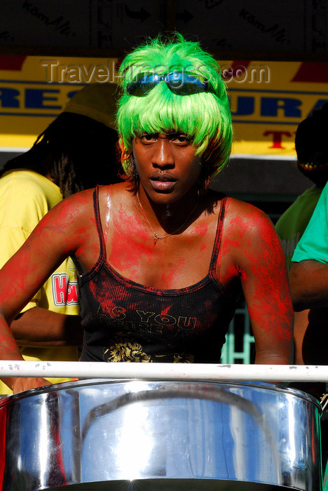trinidad-tobago74: Port of Spain, Trinidad and Tobago: steelpan - drummer with green hair playing in a steelband during carnival - photo by E.Petitalot - (c) Travel-Images.com - Stock Photography agency - Image Bank
