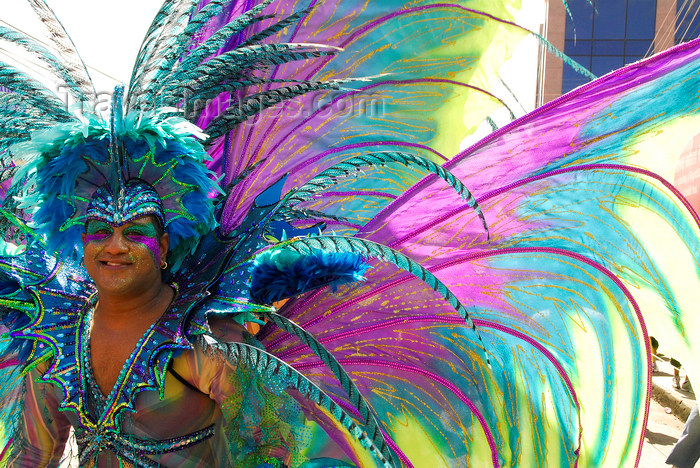 trinidad-tobago78: Port of Spain, Trinidad and Tobago: man in feathered costume - Trinidade Carnival - a five day ritual pageant - photo by E.Petitalot - (c) Travel-Images.com - Stock Photography agency - Image Bank