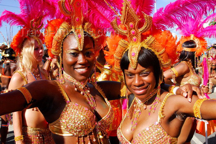 trinidad-tobago91: Port of Spain, Trinidad and Tobago: revelers dance in the streets - women with colorful feather crown during carnival - photo by E.Petitalot - (c) Travel-Images.com - Stock Photography agency - Image Bank