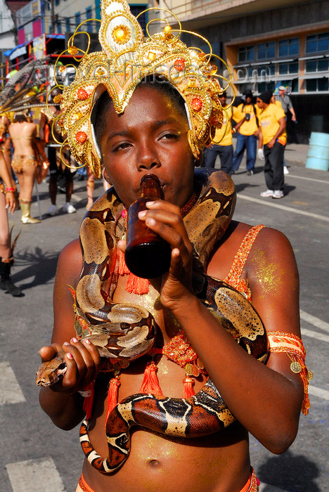 trinidad-tobago93: Port of Spain, Trinidad and Tobago: girl with a snake on the shoulders during the carnival - Maraval Road - photo by E.Petitalot - (c) Travel-Images.com - Stock Photography agency - Image Bank