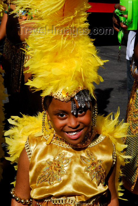 trinidad-tobago96: Port of Spain, Trinidad and Tobago: young girl in yellow costume playing mas (masquerade) - photo by E.Petitalot - (c) Travel-Images.com - Stock Photography agency - Image Bank