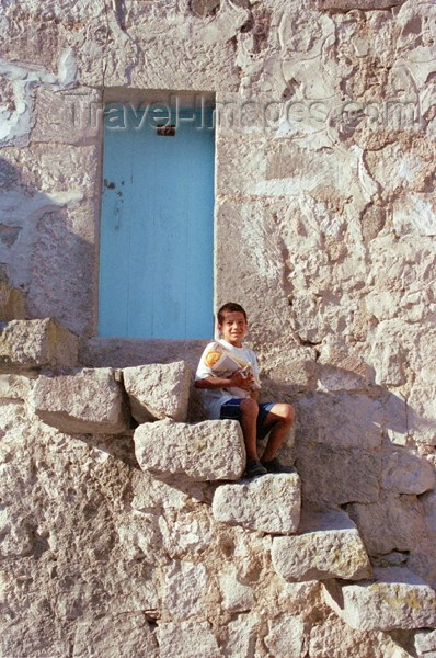 turkey126: Turkey - Belisirma / Peristrema (Nevsehir province): boy sitting on stairs - village rupestre - photo by J.Kaman - (c) Travel-Images.com - Stock Photography agency - Image Bank