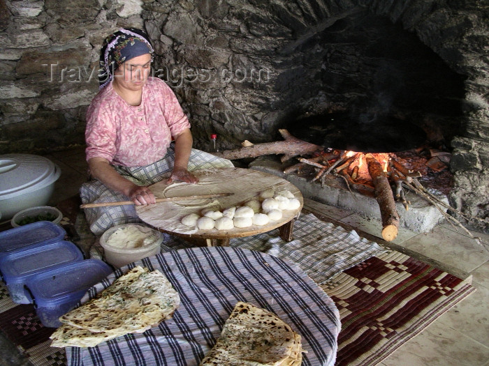 turkey152: Turkey - Selcuk / Seljuk Selcuk: gozleme maker: gozleme maker - photo by R.Wallace - (c) Travel-Images.com - Stock Photography agency - Image Bank