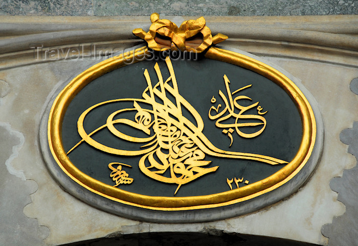 turkey202: Istanbul, Turkey: Sultan Mahmoud II's tughra over the Imperial Gate at Topkapi Palace - calligraphic seal, the Sultan's monogram - Islamic calligraphy - Eminönü-District - photo by M.Torres - (c) Travel-Images.com - Stock Photography agency - Image Bank