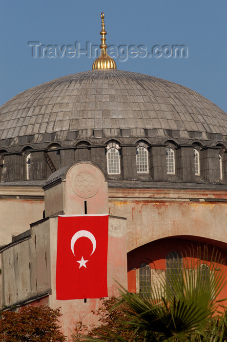 turkey205: Istanbul, Turkey: dome and flag - Aya Sofya - Sancta Sophia - Hagia Sophia - photo by J.Wreford - (c) Travel-Images.com - Stock Photography agency - Image Bank