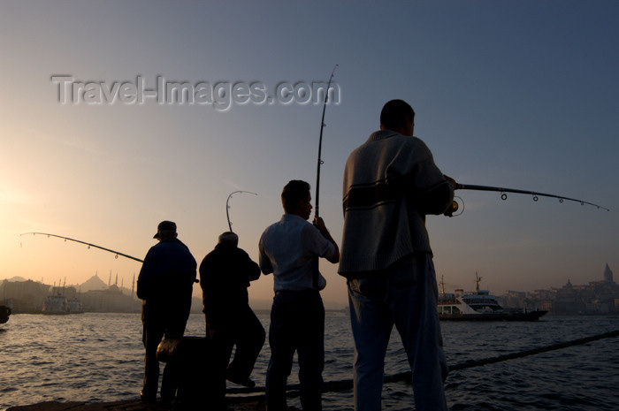 turkey217: Istanbul, Turkey: fishermen the Bosphorus - photo by J.Wreford - (c) Travel-Images.com - Stock Photography agency - Image Bank