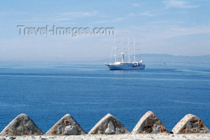 turkey225: Turkey - Bodrum: Saint Peters's castle - gun embrasure / crenelle and MYS Wind Surf cruiseship, formerly the Club Med - photo by M.Bergsma - (c) Travel-Images.com - Stock Photography agency - Image Bank