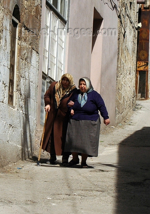 turkey260: Gaziantep, South-Eastern Anatolia, Turkey: old women help each other - photo by C. le Mire - (c) Travel-Images.com - Stock Photography agency - Image Bank