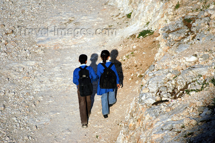 turkey312: Urfa / Edessa / Urhai / Riha / Sanliurfa, Southeastern Anatolia, Turkey: two school children and their shadows - photo by C. le Mire - (c) Travel-Images.com - Stock Photography agency - Image Bank