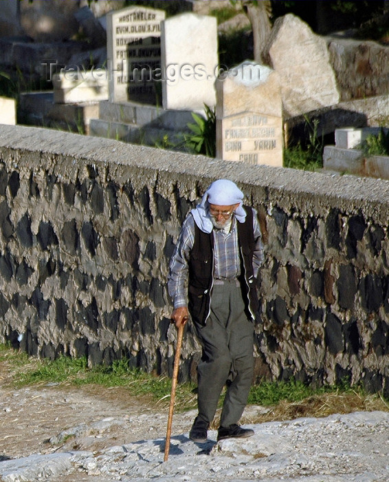 turkey315: Turkey - Urfa / Edessa: old man walking by the cemetery - photo by C. le Mire - (c) Travel-Images.com - Stock Photography agency - Image Bank