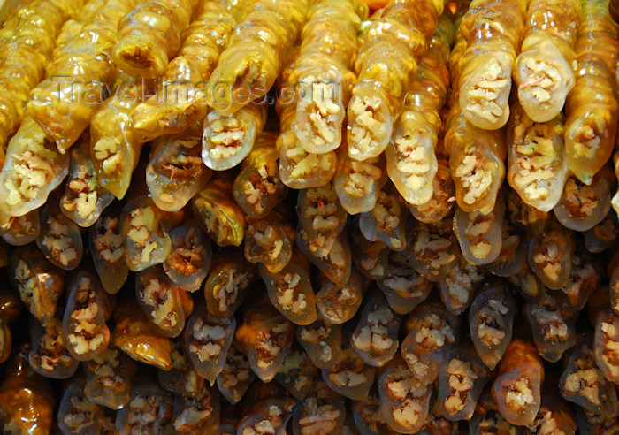 turkey427: Istanbul, Turkey: Turkish sweets - Churchkhela - walnuts in candy cylinders - walnut sausage - pestil cevizli sucuk- Spice Bazaar aka Egyptian Bazaar - Eminönü District - photo by M.Torres - (c) Travel-Images.com - Stock Photography agency - Image Bank