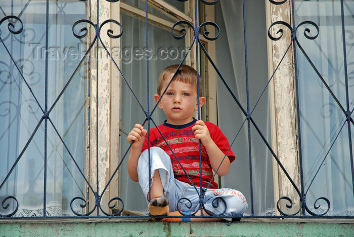 turkey527: Yusufeli, Artvin Province, Black Sea region, Turkey: boy in a balcony - photo by W.Allgöwer - (c) Travel-Images.com - Stock Photography agency - Image Bank