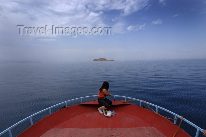 turkey549:  Lake Van / Gola Wanê / Van Gölü, Van province, Eastern Anatolia, Turkey: girl in a boat's prow - photo by J.Wreford - (c) Travel-Images.com - Stock Photography agency - Image Bank