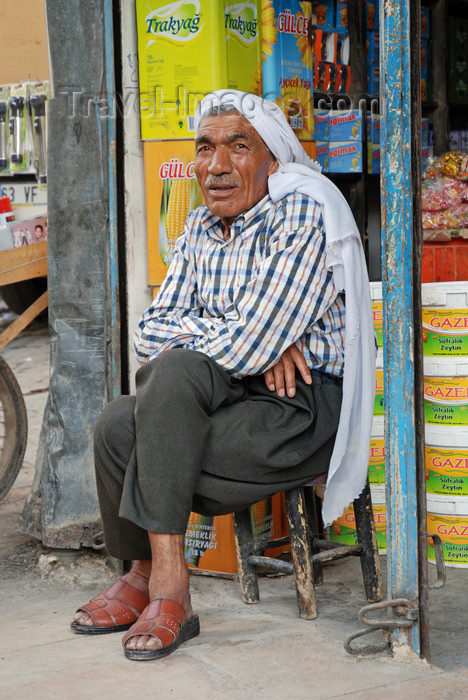 turkey557: Urfa / Edessa / Sanliurfa, Southeastern Anatolia, Kurdistan, Turkey: Kurdish man in his store - photo by W.Allgöwer - (c) Travel-Images.com - Stock Photography agency - Image Bank