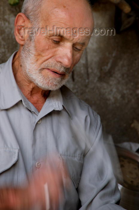 turkey580: Mardin - Southeastern Anatolia, Turkey: artisan working the metal - photo by J.Wreford - (c) Travel-Images.com - Stock Photography agency - Image Bank