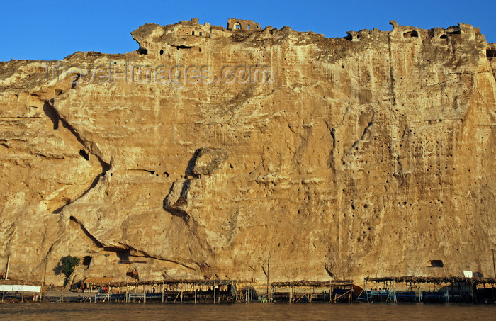 turkey611: Hasankeyf / Heskif, Batman Province, Southeastern Anatolia, Turkey: stairs and caves carved on the limestone cliff rising vertically above the river Tigris - photo by W.Allgöwer - (c) Travel-Images.com - Stock Photography agency - Image Bank