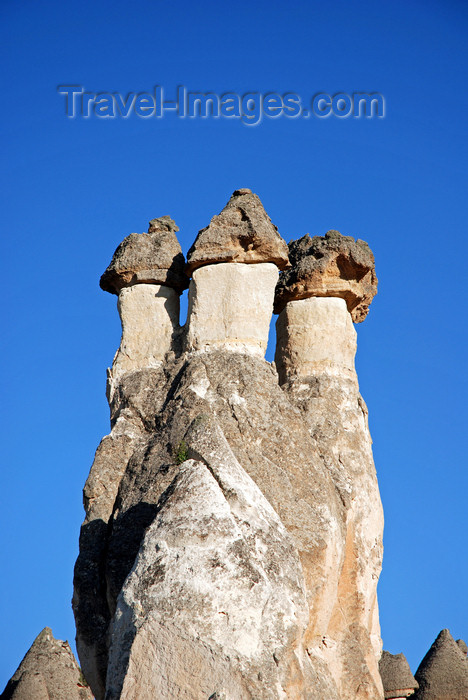 turkey648: Cappadocia - Göreme, Nevsehir province, Central Anatolia, Turkey: three basalt boulders over tuff cones - fairy chimneys - Valley of the Monks - Pasabagi Valley- photo by W.Allgöwer - (c) Travel-Images.com - Stock Photography agency - Image Bank