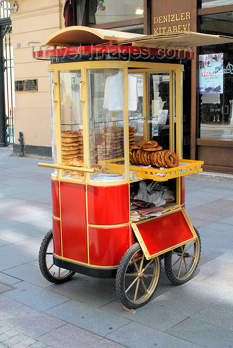 turkey89: Istanbul, Turkey: simit bread troley on Istiklal caddesi in front of Denizler Kitabeyi, a bookshop - Beyoglu - photo by M.Torres - (c) Travel-Images.com - Stock Photography agency - Image Bank