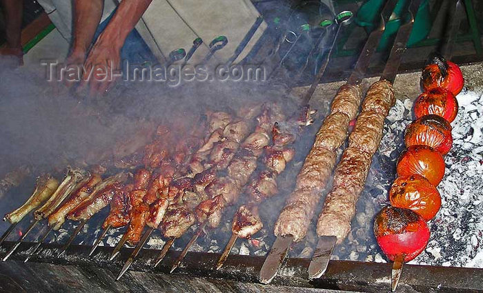 turkmenistan103: Ashgabat - Turkmenistan - preparing meat and vegetable shashliks - Shish kebabs - mangal grill - photo by G.Karamyanc / Travel-Images.com - (c) Travel-Images.com - Stock Photography agency - Image Bank