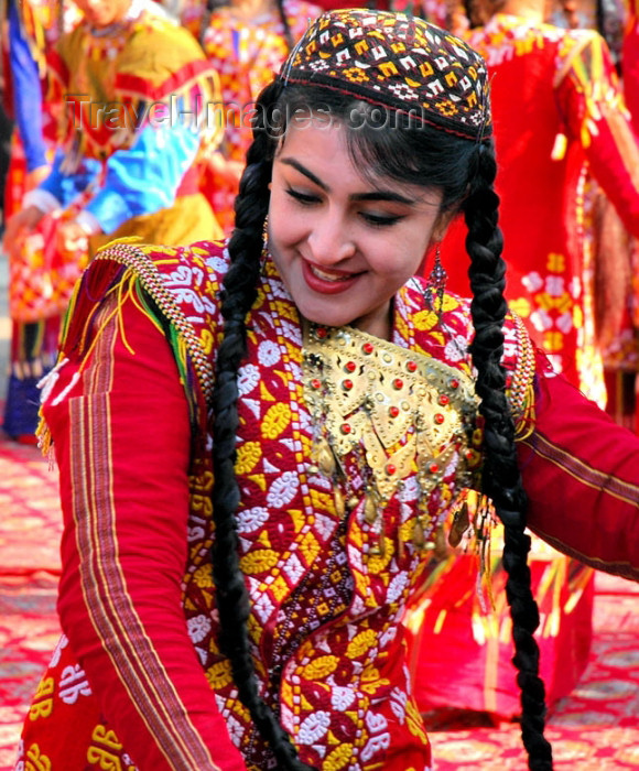 turkmenistan25: Turkmenistan - Ashgabat: happy dancer - Central Asian girl with long braids - photo by G.Karamyancr - (c) Travel-Images.com - Stock Photography agency - Image Bank