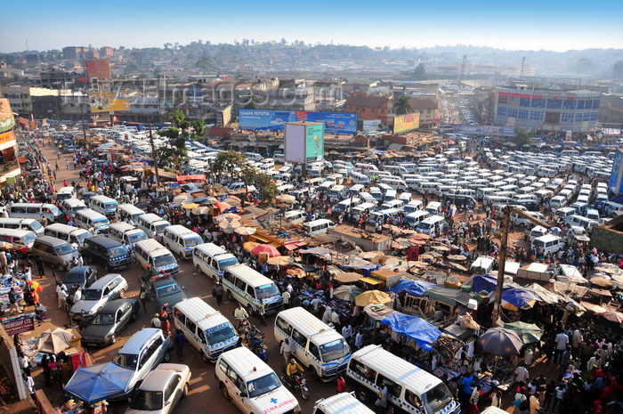 uganda131: Kampala, Uganda: share taxis and commerce both use Burton street - Old Taxi Park - aglomeration of matatu share taxis - photo by M.Torres - (c) Travel-Images.com - Stock Photography agency - Image Bank