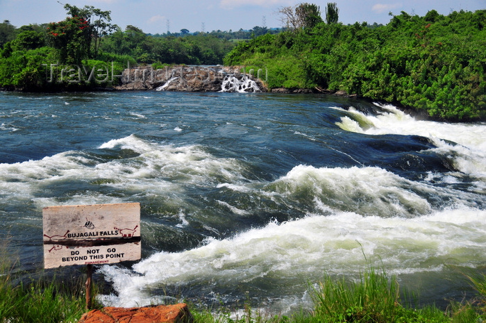 uganda151: Bujagali Falls, Jinja district, Uganda: danger sign at the edge of the Bujagali falls on the river Nile - Eastern bank - in 2012 the falls were submerged by the Bujagali Dam - photo by M.Torres - (c) Travel-Images.com - Stock Photography agency - Image Bank