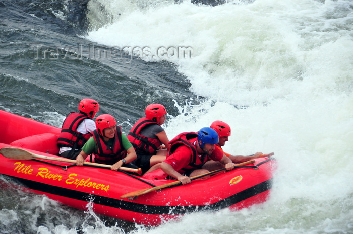 uganda155: Bujagali Falls, Jinja district, Uganda: white water rafters on an inflatable boat - catarats on the river Nile - seen from the Eastern bank - in 2012 the falls were submerged by the Bujagali Dam - photo by M.Torres - (c) Travel-Images.com - Stock Photography agency - Image Bank