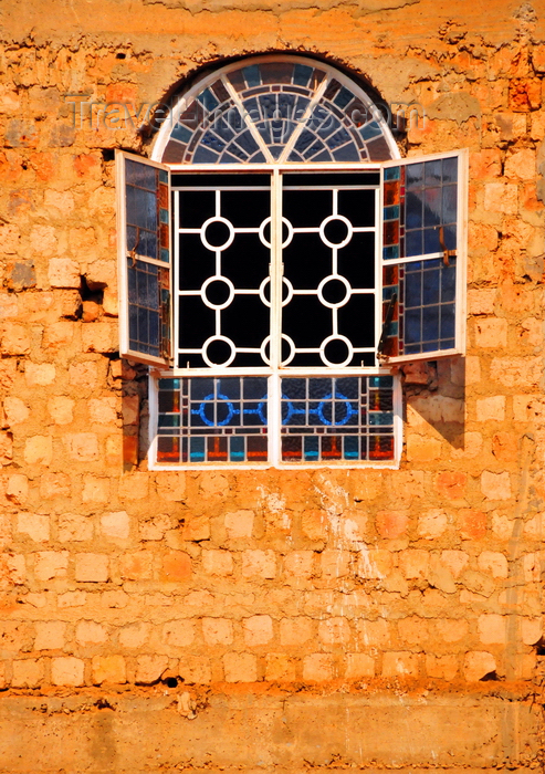 uganda59: Kampala, Uganda: church window on Kikaya Hill - crude masonry wall - photo by M.Torres - (c) Travel-Images.com - Stock Photography agency - Image Bank