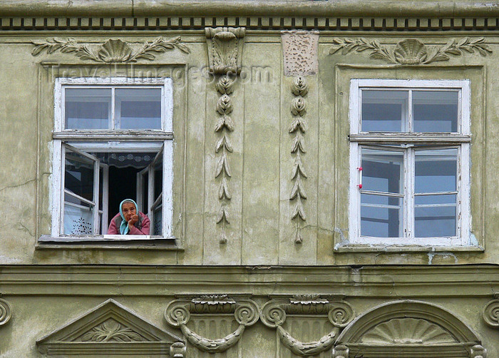 ukra87: Lviv / Lvov, Ukraine: old lady looking out from window - photo by J.Kaman - (c) Travel-Images.com - Stock Photography agency - Image Bank