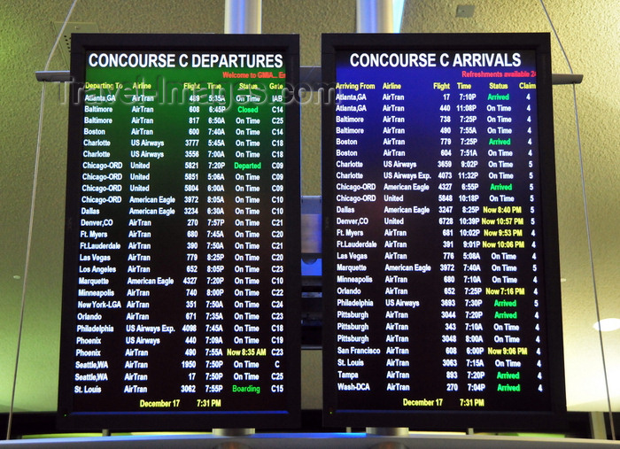 usa1055: Milwaukee, Wisconsin, USA: General Mitchell International Airport - arrivals and departures screens - concourse C - MKE - airport terminal scene - photo by M.Torres - (c) Travel-Images.com - Stock Photography agency - Image Bank