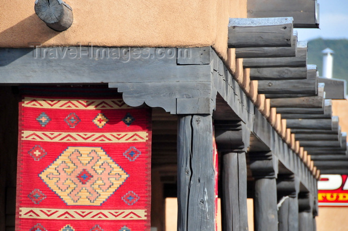 usa1602: Taos, New Mexico, USA: carpet protects a colonnade from the sun - Taos Plaza - photo by M.Torres - (c) Travel-Images.com - Stock Photography agency - Image Bank